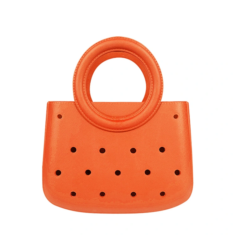 Cosa rende una mini borsa a mano con manico rotondo in EVA la scelta migliore per il trasporto moderno e leggero?